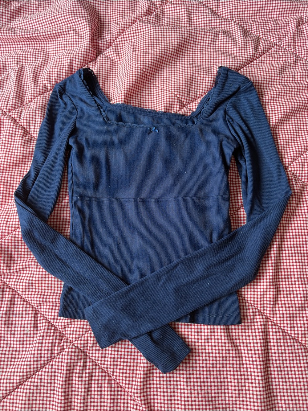 Navy blue, long sleeved lacy top